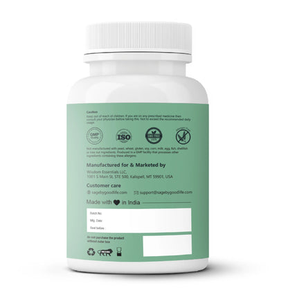 White supplement bottle with green label on a white background